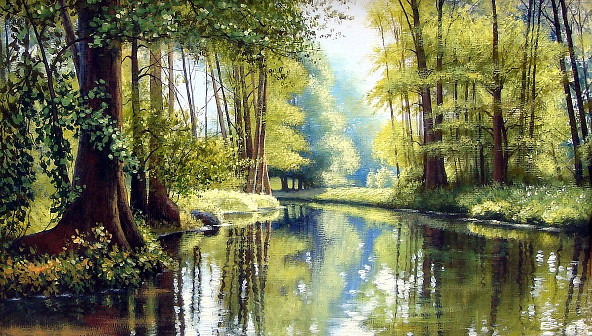 A river with trees and grass