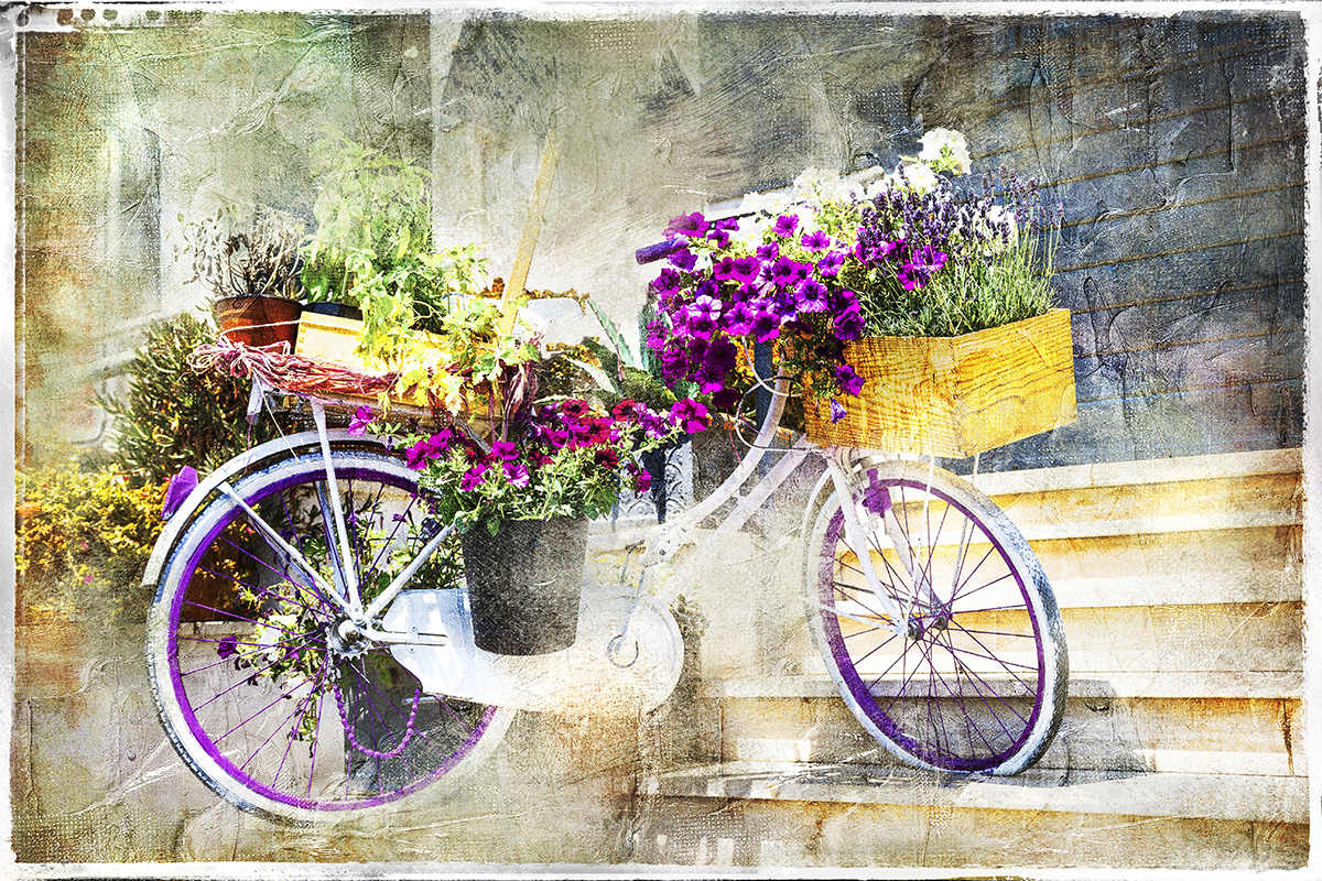 A bicycle with flowers on it