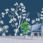 A white flowers and plants on a blue background