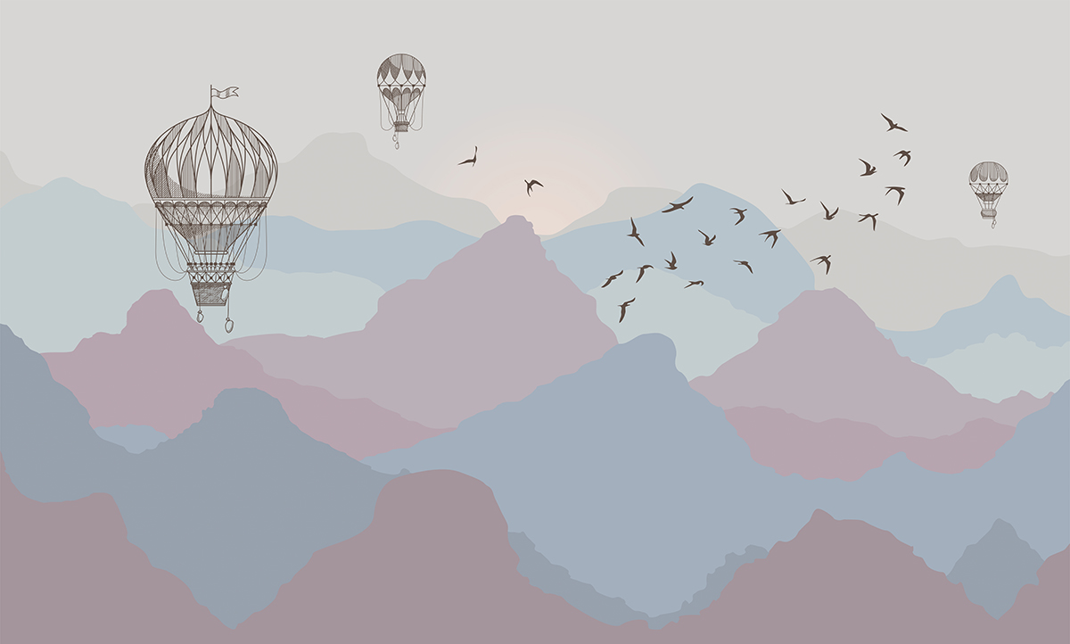 A hot air balloons flying over mountains