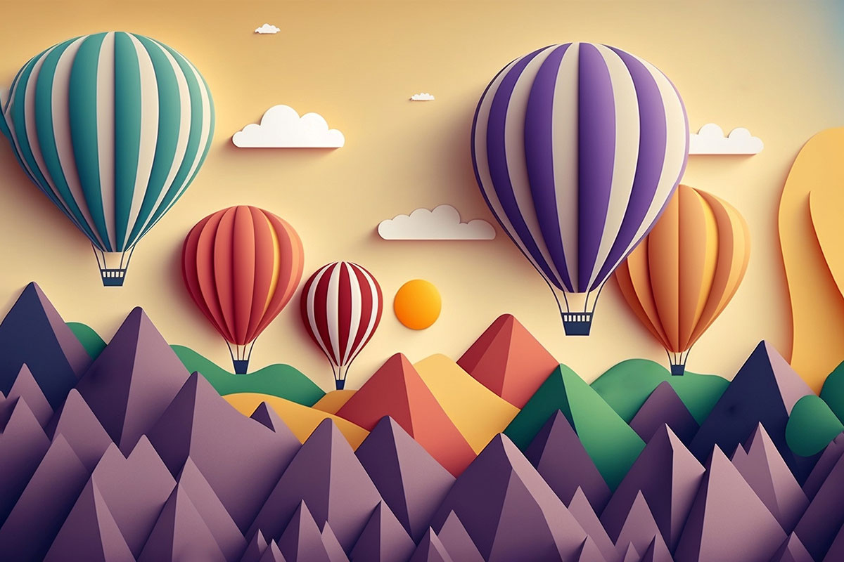 Hot air balloons flying over mountains