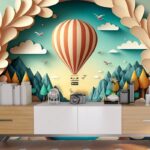 A paper cut out of a landscape with a hot air balloon and boats