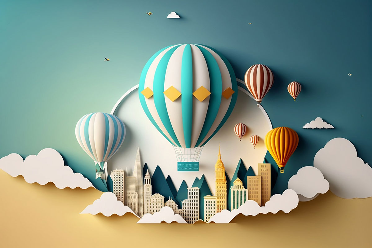 A paper cut out of a city with hot air balloons