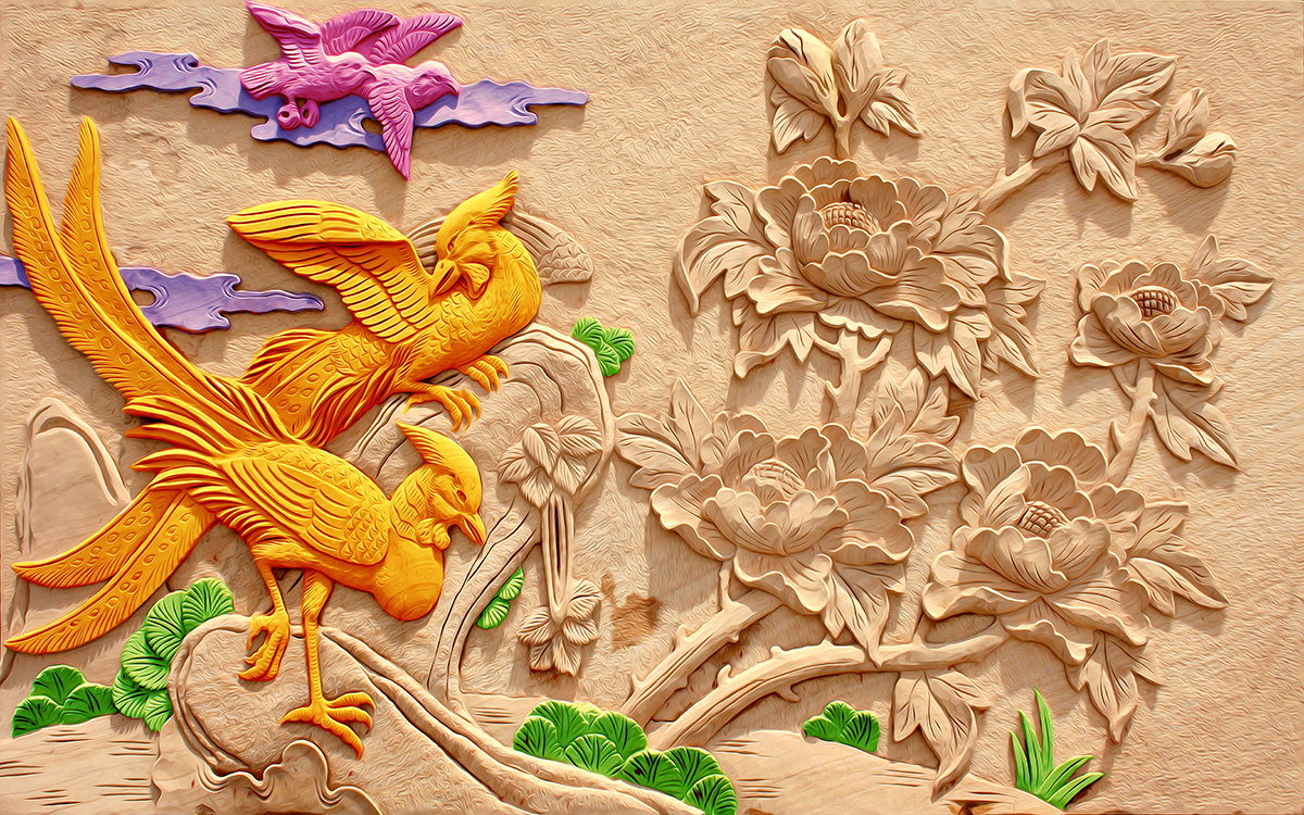 A carved wood carving of birds and flowers