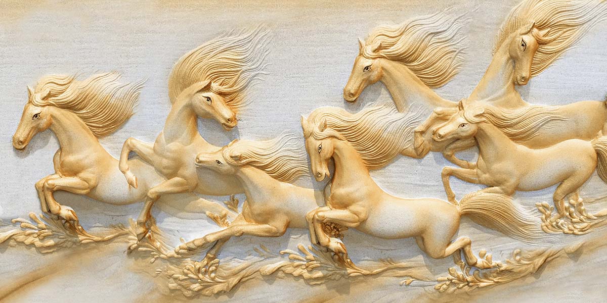 A sculpture of horses running