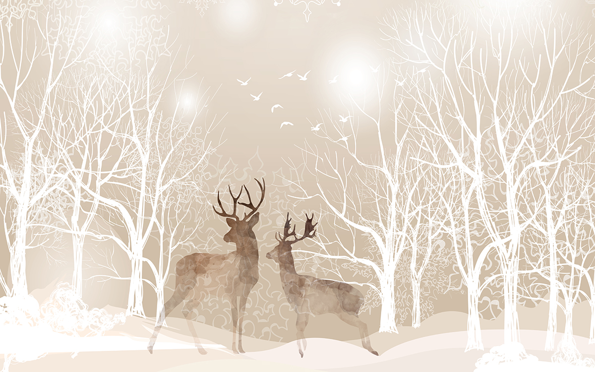 A couple of deer in a snowy forest