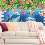 A mural of dolphins under water with flowers and bricks