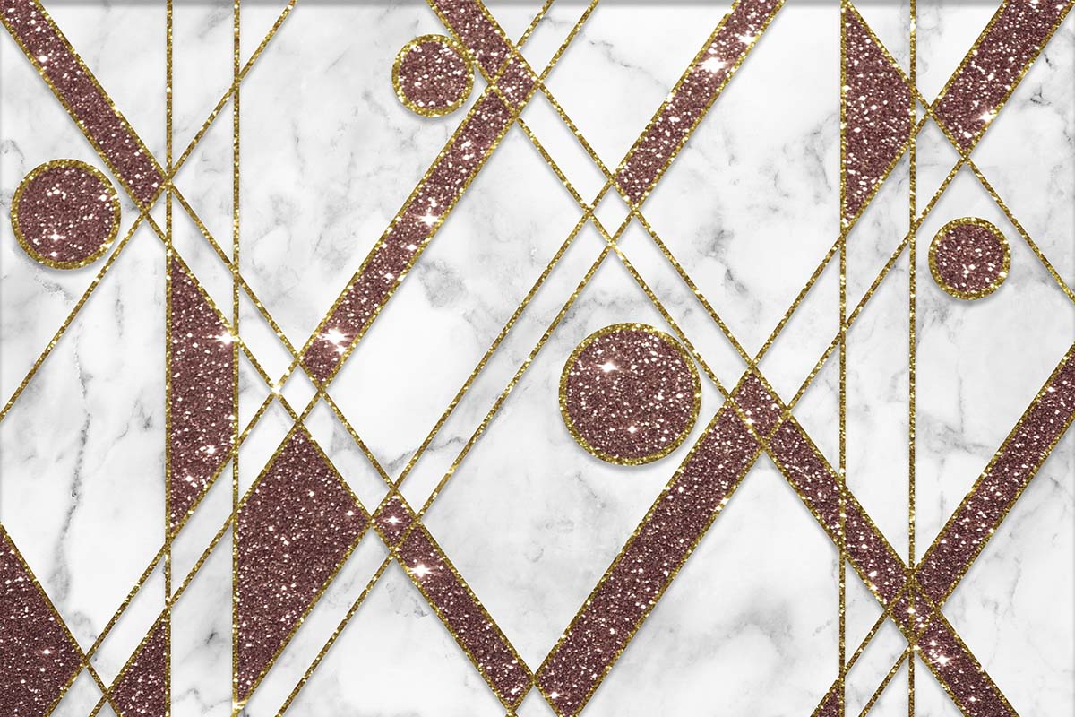 A pink and gold glittery pattern on a marble surface