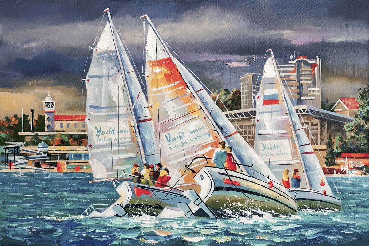 A group of sailboats on water