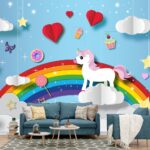 A paper cut out of a unicorn on a cloud with a rainbow and stars