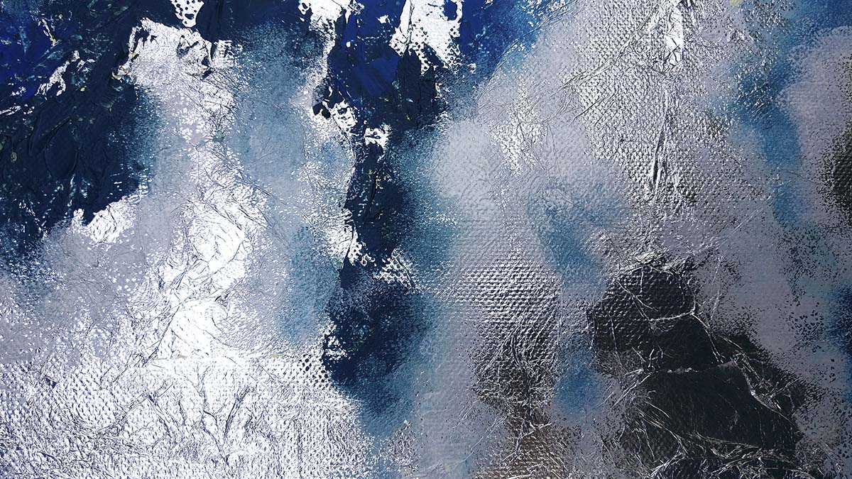 A close up of a blue and white surface