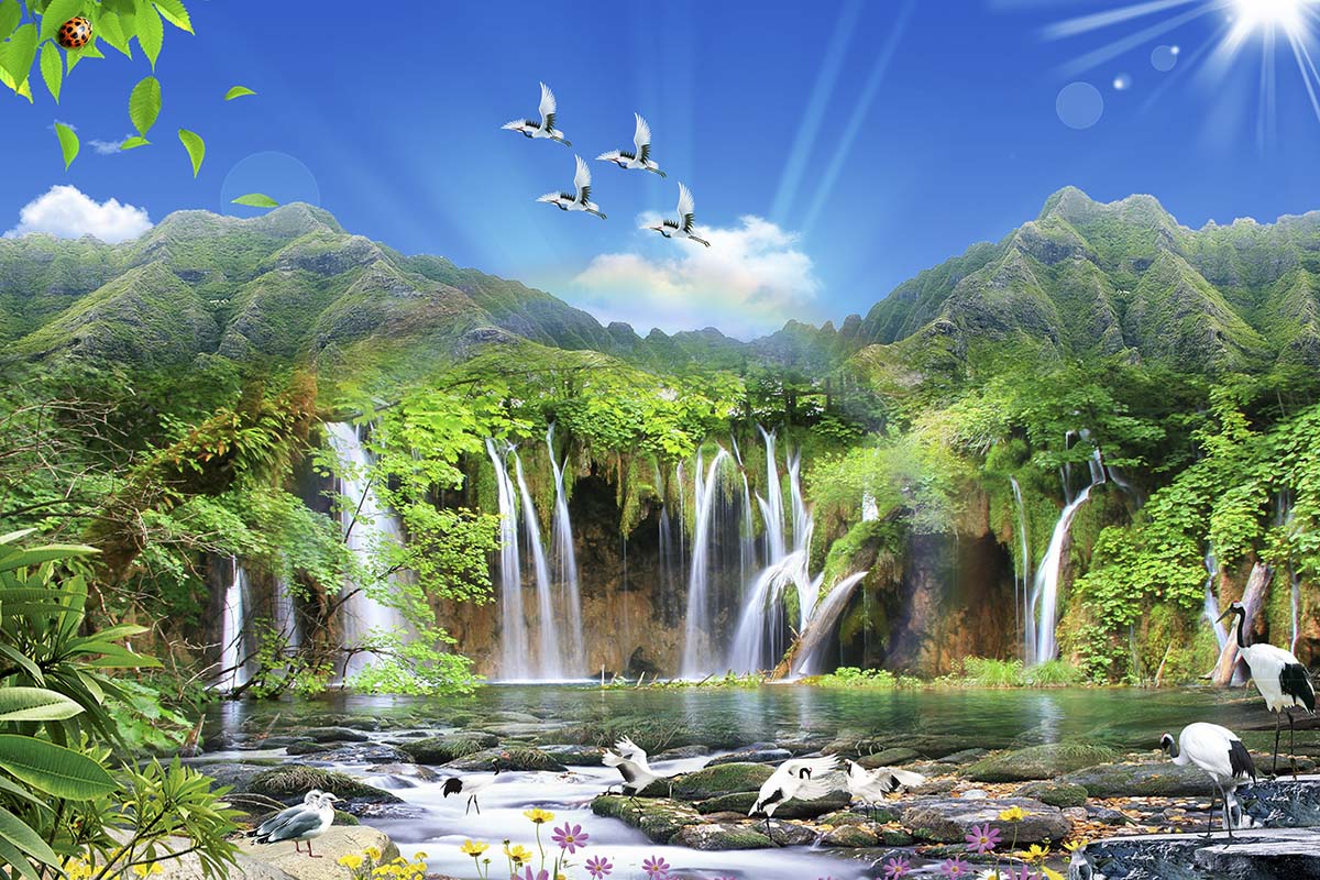 A waterfall with birds flying over it