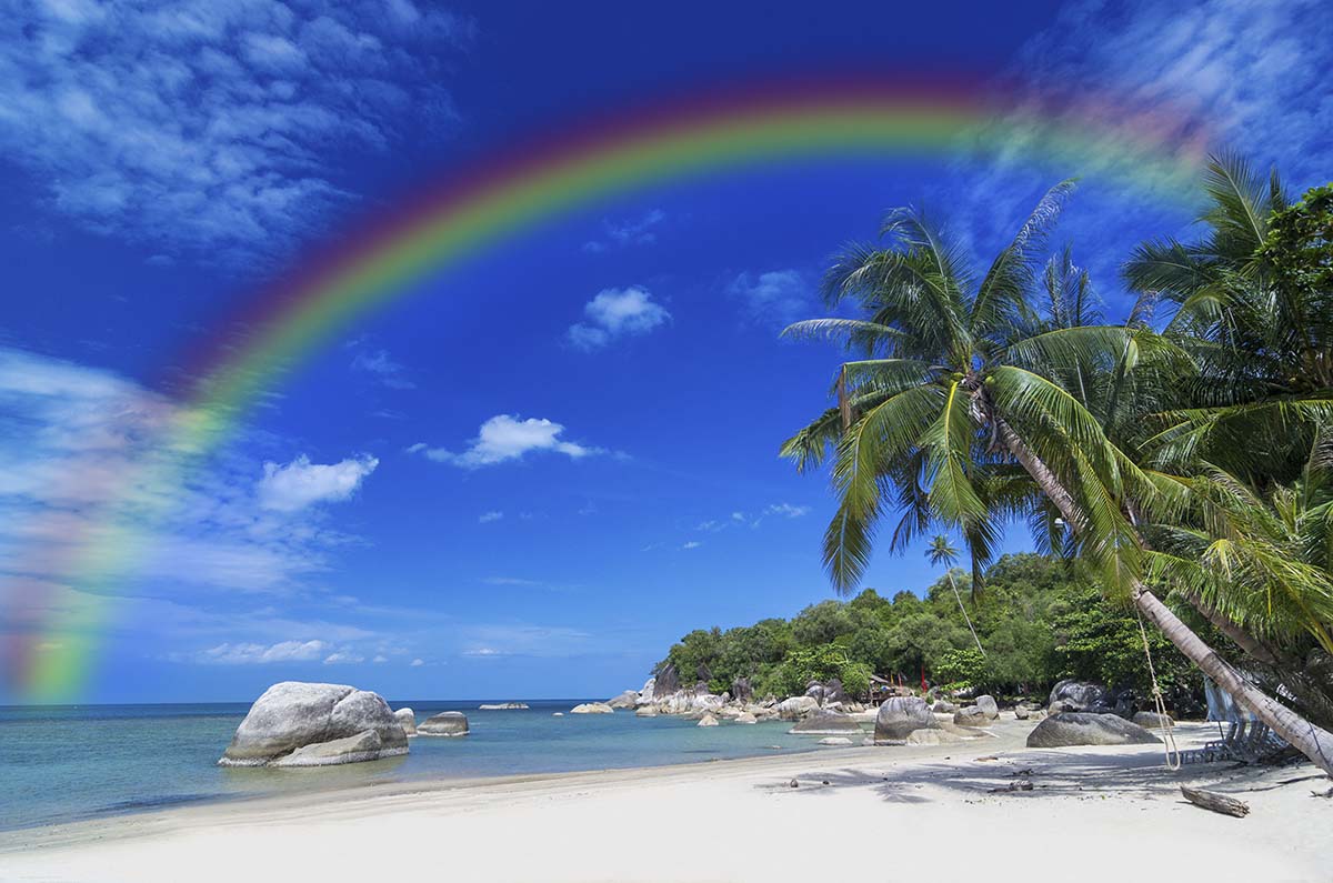 A rainbow over a beach