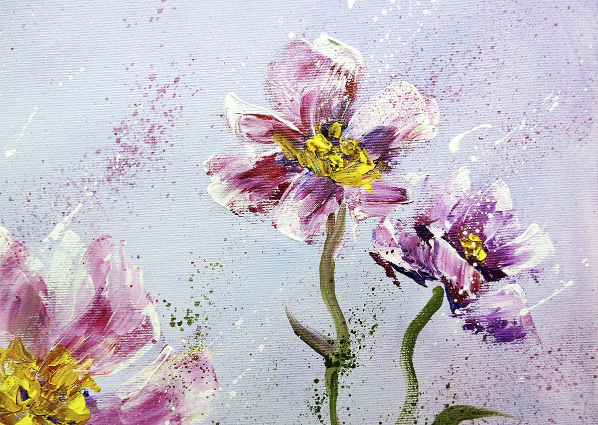 A painting of flowers on a white surface