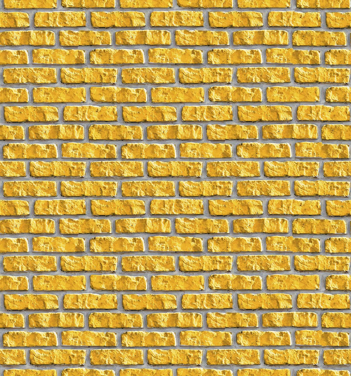 A yellow brick wall with white edges