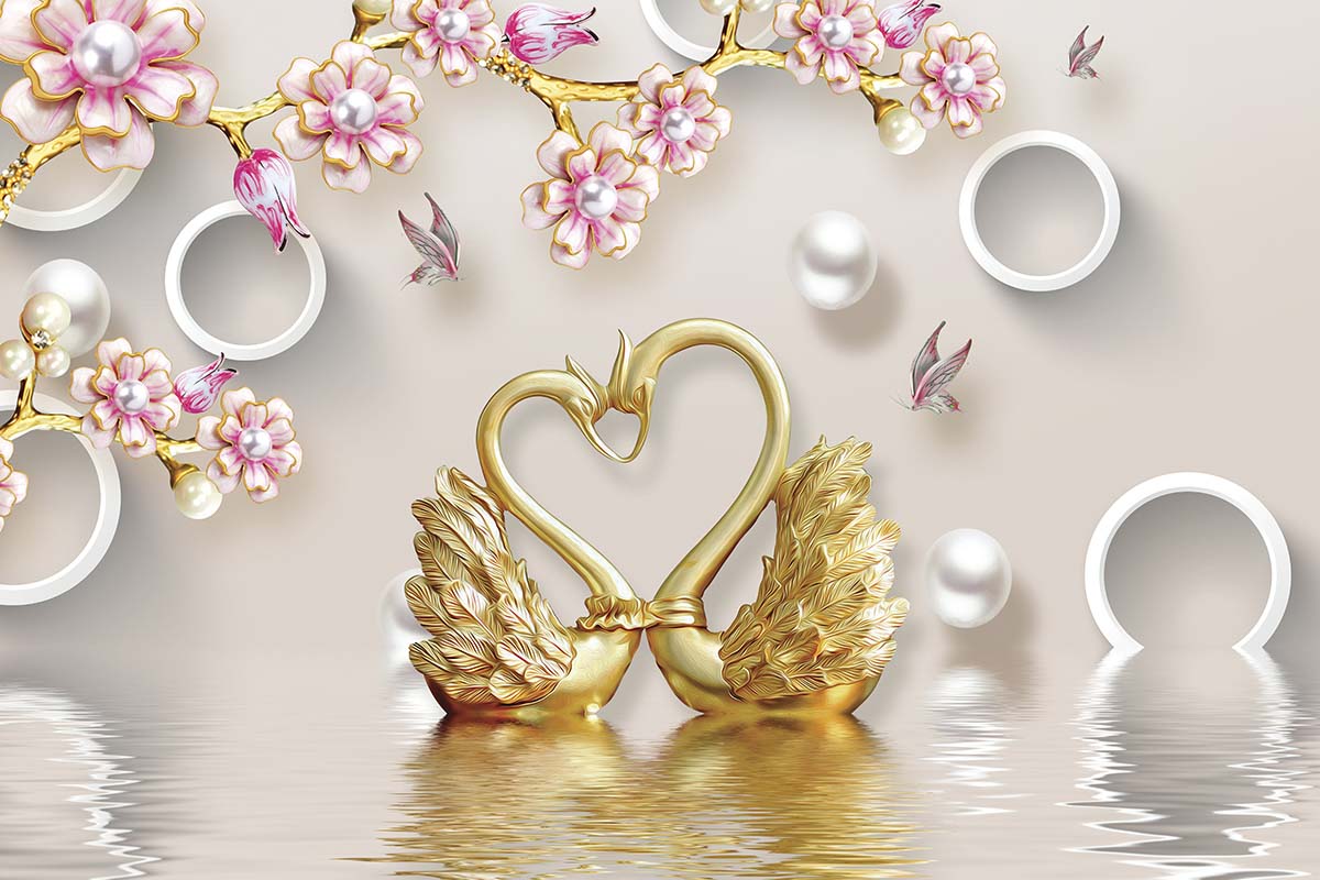 A gold swans in the shape of a heart with a couple of birds and flowers