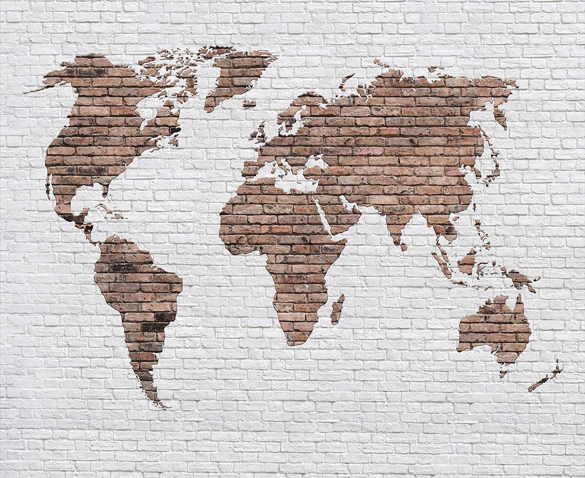 A map of the world on a brick wall