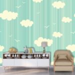 A blue and white striped background with white clouds and birds