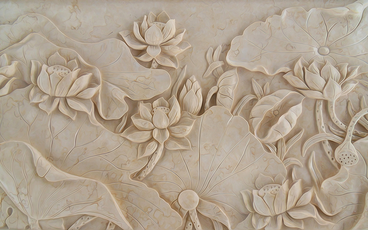 A stone carving of flowers and leaves