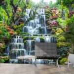 A waterfall surrounded by trees and plants