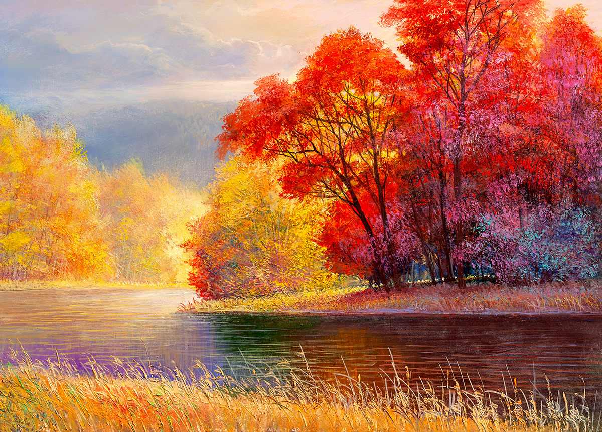 A lake with colorful trees and grass
