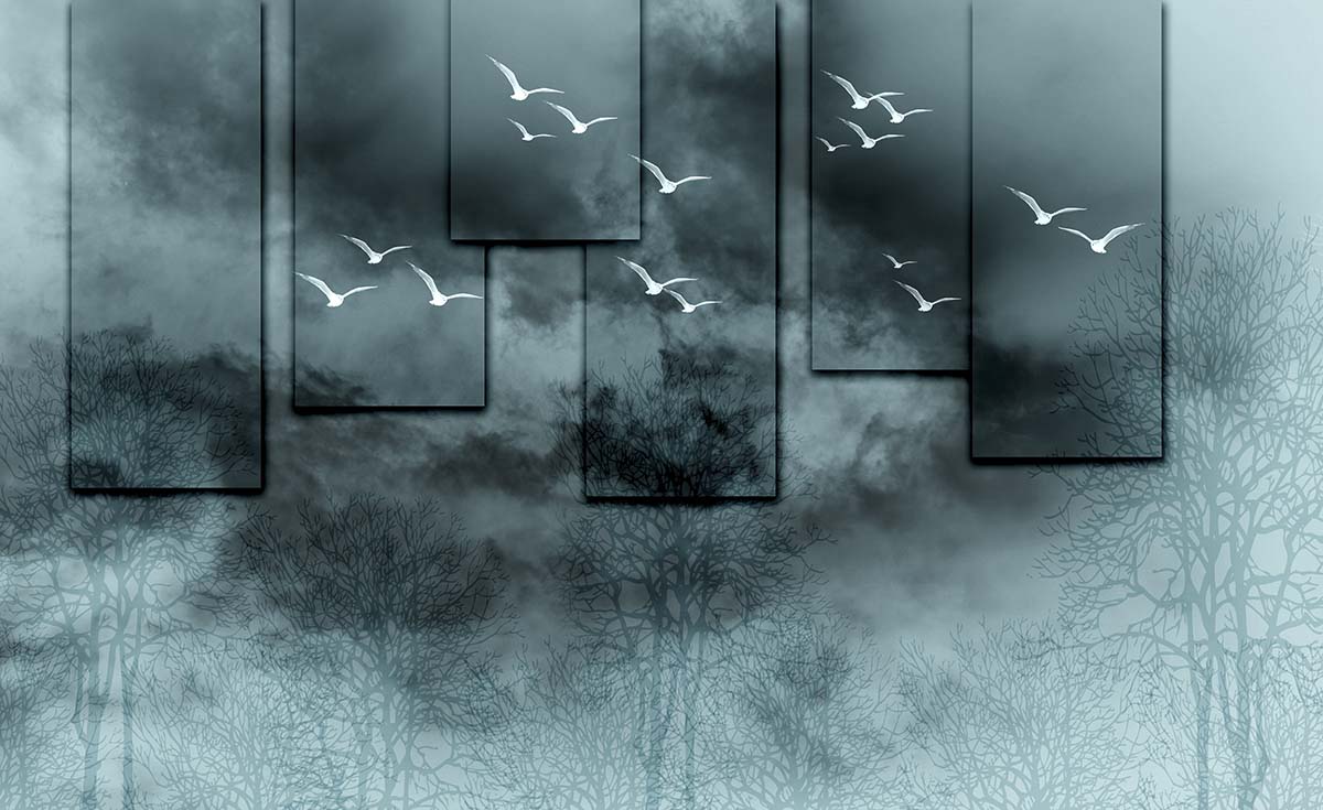 Birds flying in the sky