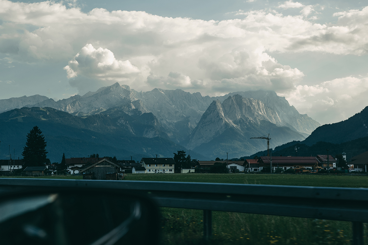 A road with a mountain in the background