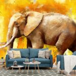 An elephant walking on a yellow background