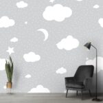 A grey and white background with clouds and stars