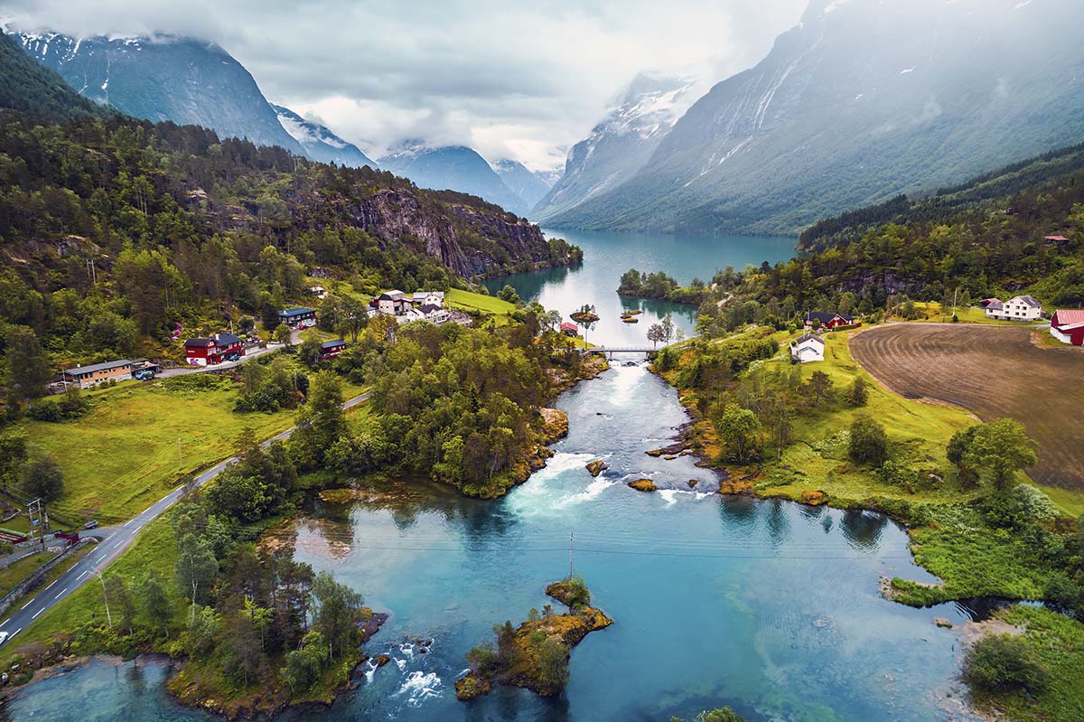 A river with a bridge and a small town on it