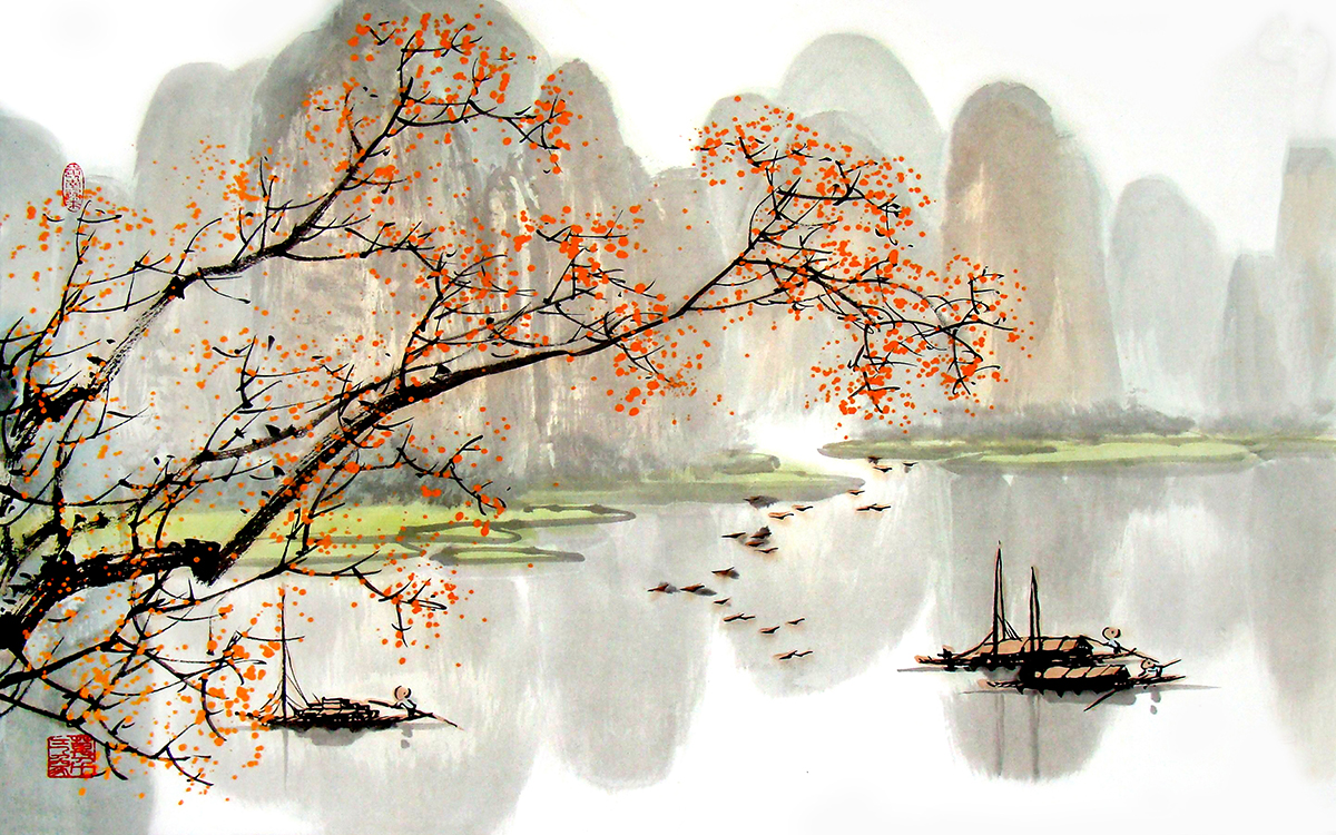 A tree with orange leaves on a lake